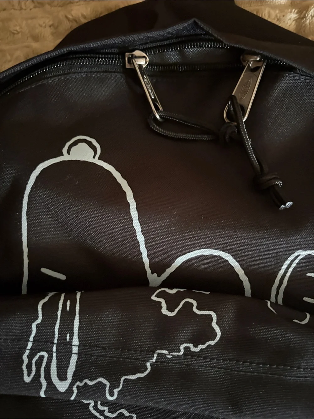 Eastpak Black Backpack with White Peanuts Graphic
